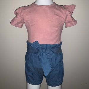 Pink bodysuit with blue jean shorts